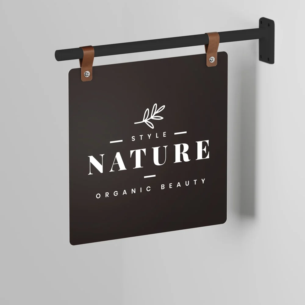 An image of the Custom Black Hanging Sign product with a logo print and hanging on the wall.