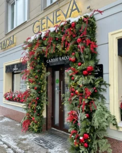 An image from the Christmas decoration ideas blog post. The image shows a store door decorated for Christmas.